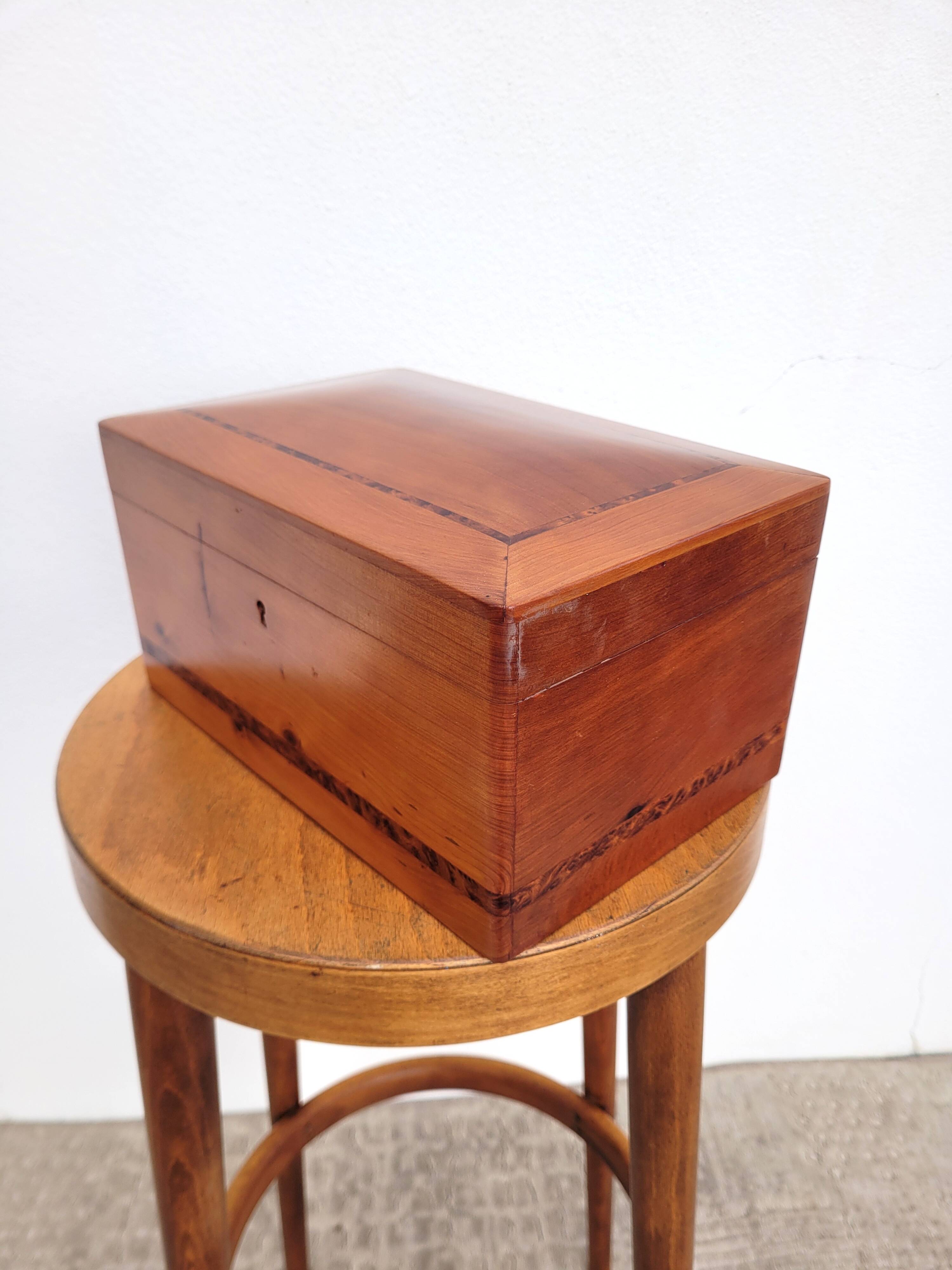 Old compartmentalized jewelry box