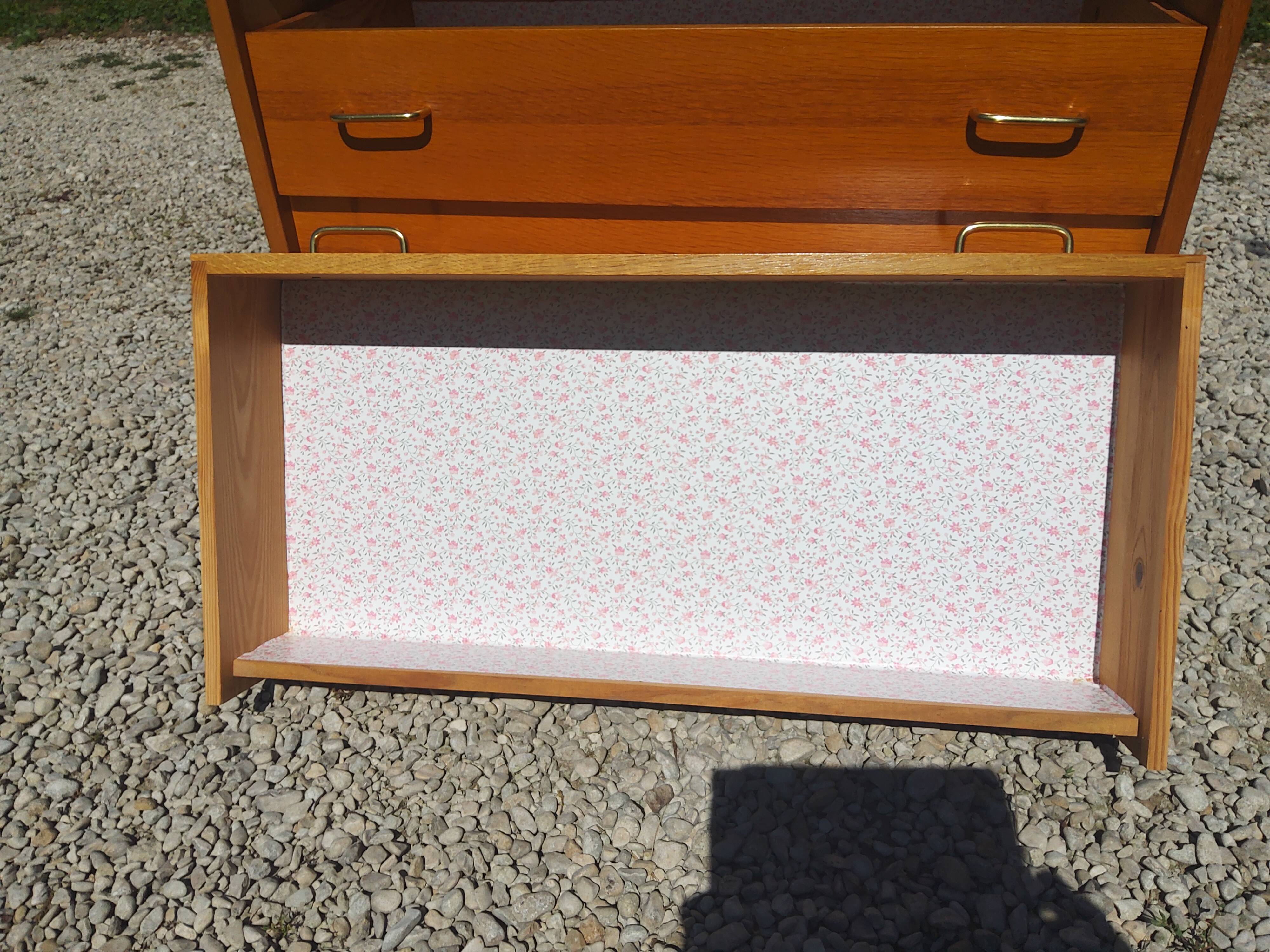 Compass feet chest of drawers