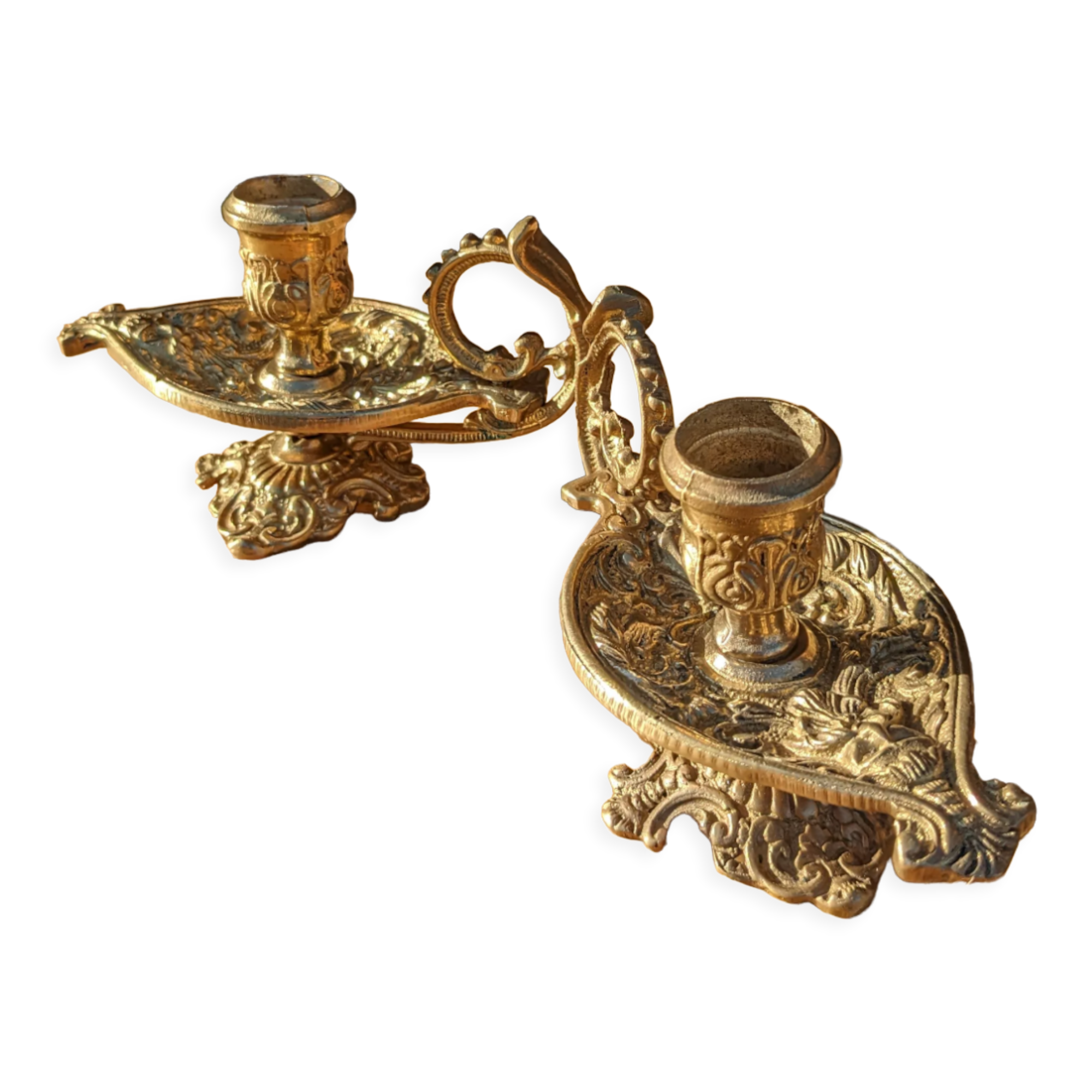 Pair of solid brass and arabesque candle holders