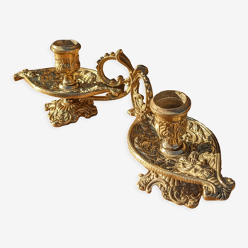 Pair of solid brass and arabesque candle holders