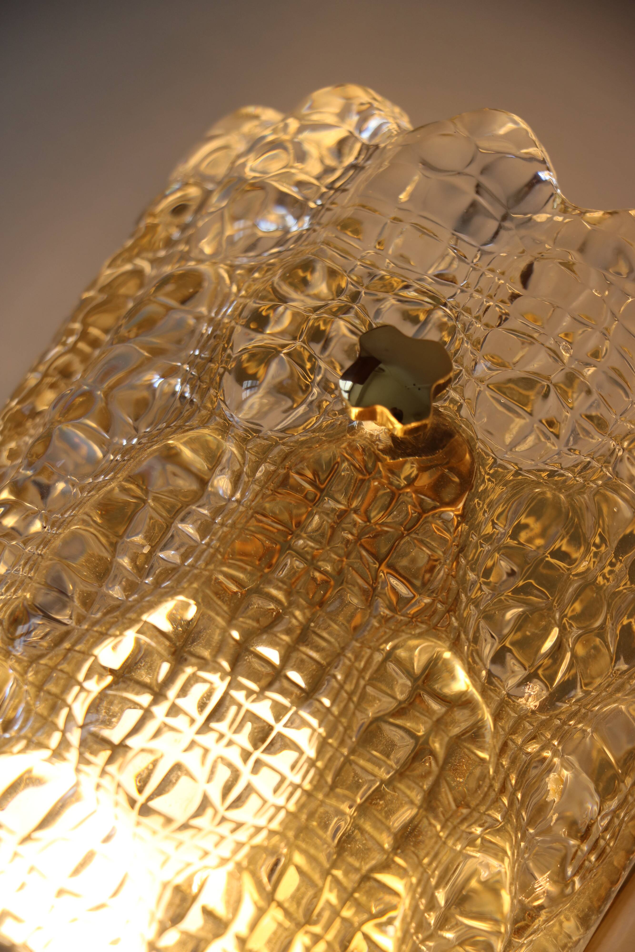 Pair of glass and brass wall lights by Carl Fagerlund for Orrefors.