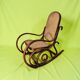 Antique curved wooden rocking chair with caning in Thonet style - Child size