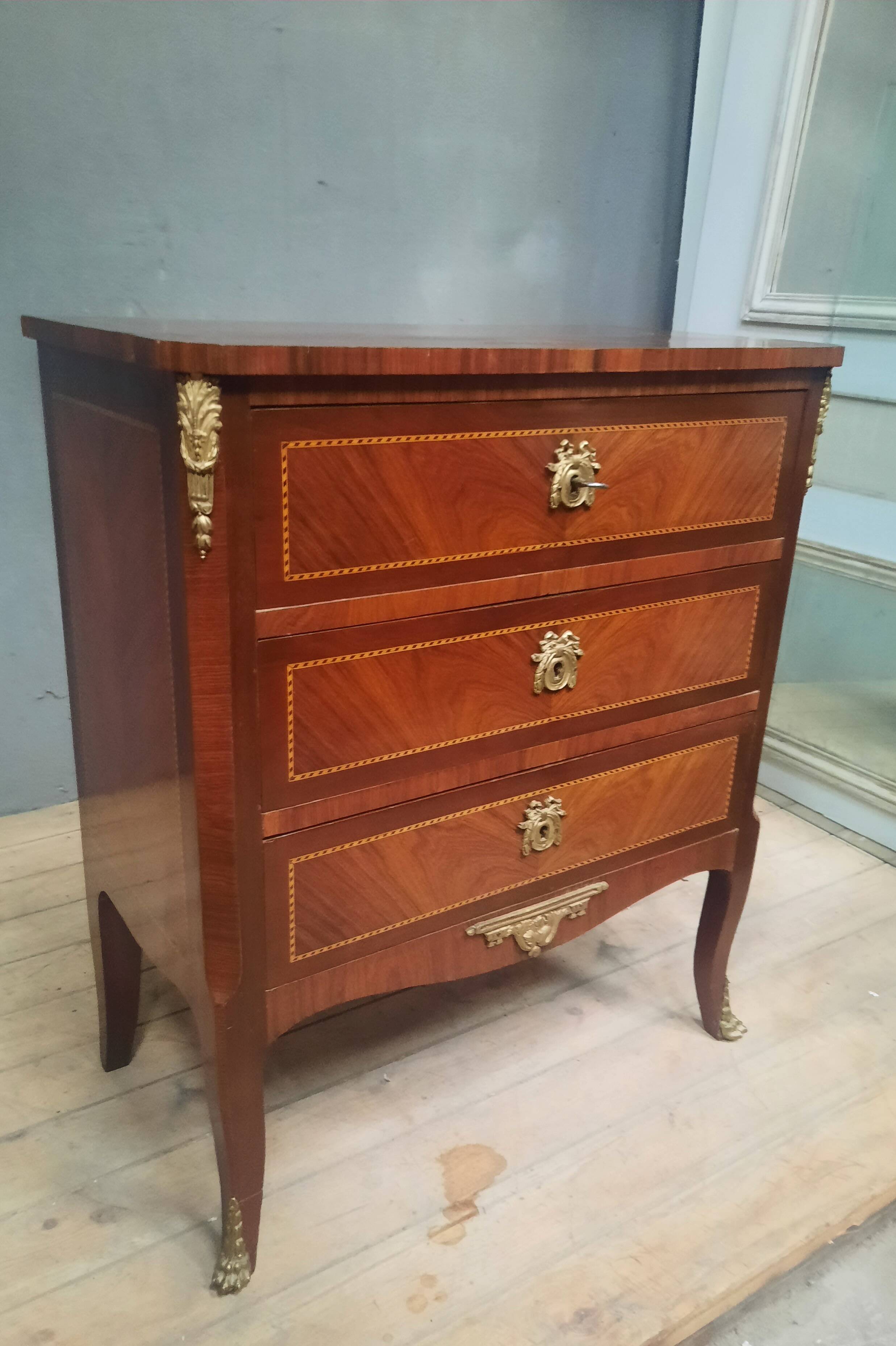 Small transitional style inlaid chest of drawers