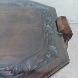 Art Deco style coffee table in carved natural wood