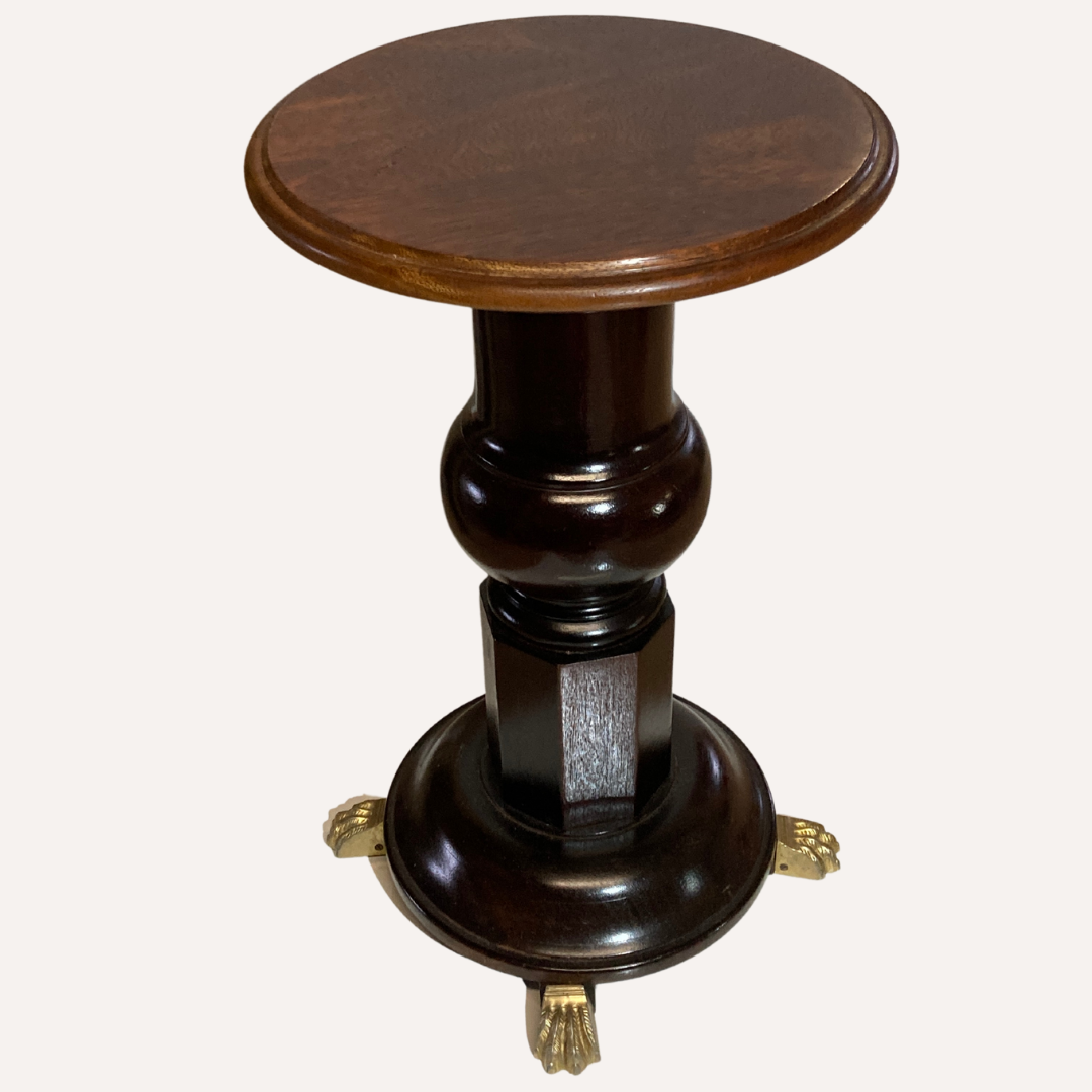 Vintage mahogany pedestal or side table with brass claw feet