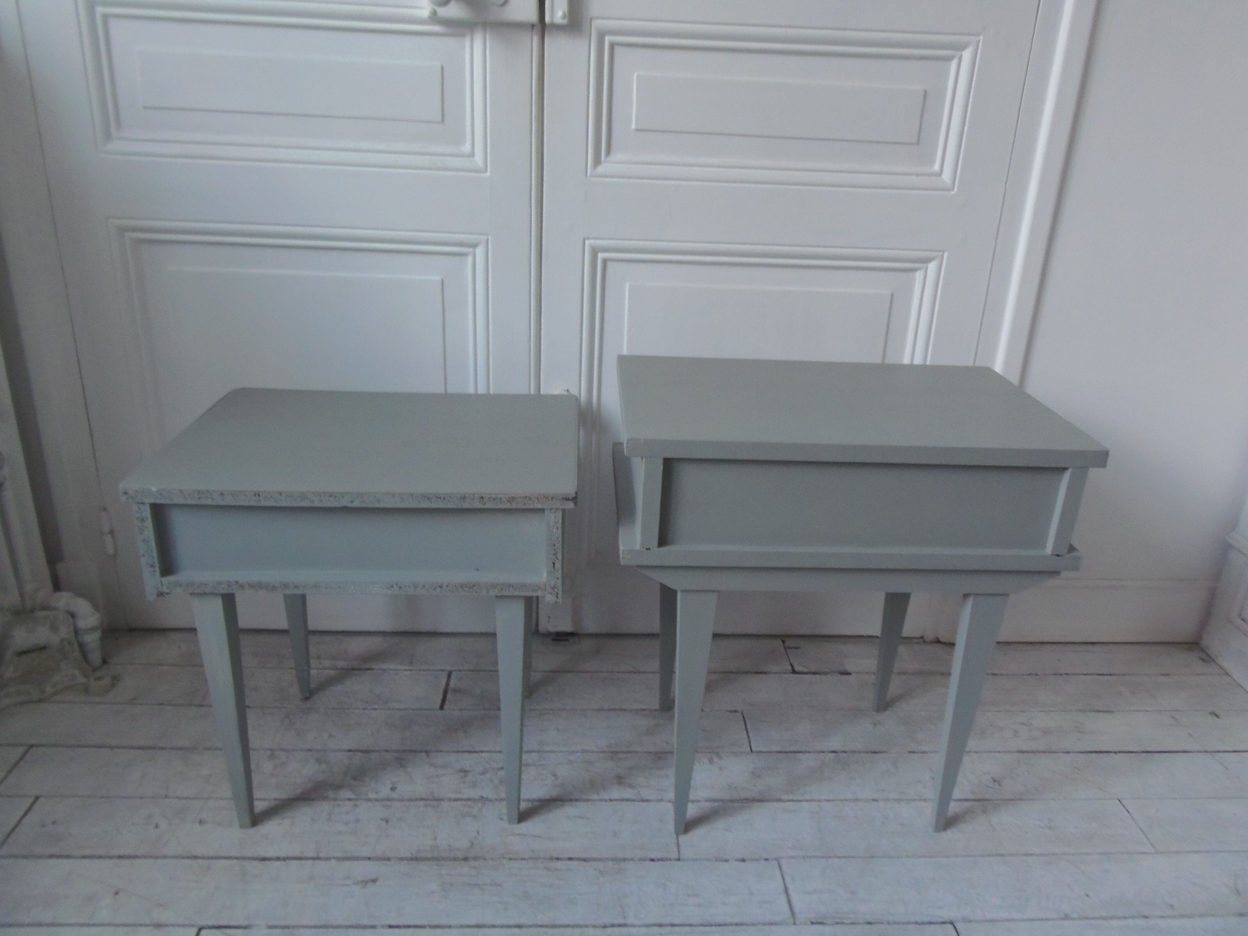 Duo of bedside tables, mismatched vintage sofa ends green of gray