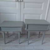 Duo of bedside tables, mismatched vintage sofa ends green of gray