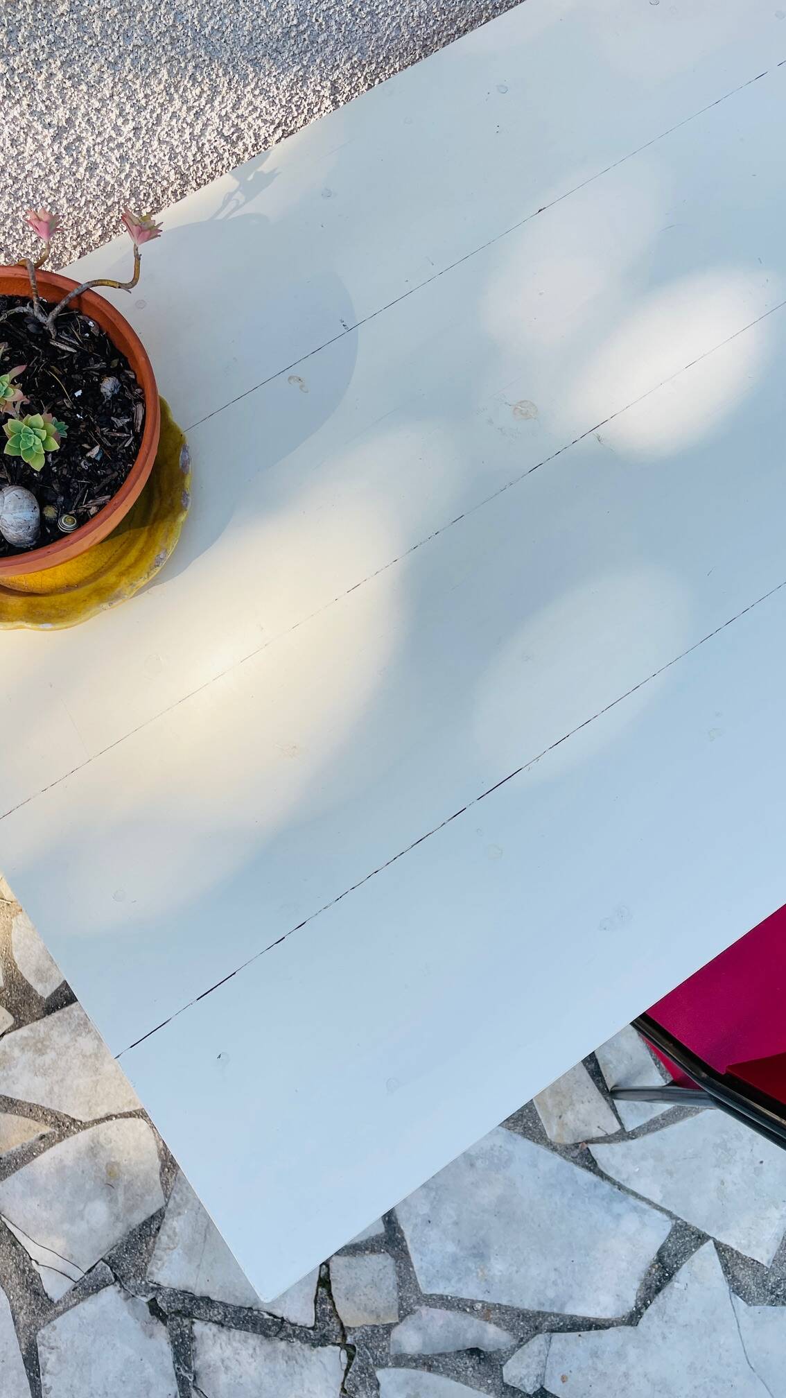 Vintage oak farmhouse table with a white top.