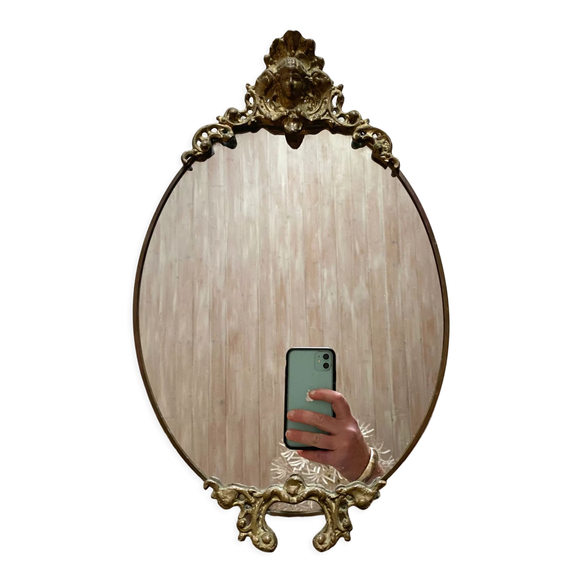 Antique oval brass crest mirror, 41x26 cm