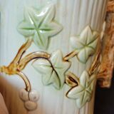 Old pitcher in slip 1900 ivy or holly decoration
