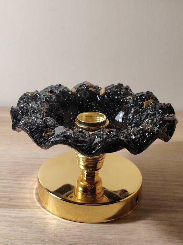 Fleur de Murano noire et dorée en applique murale