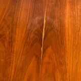 Baumann style wooden table with extensions.