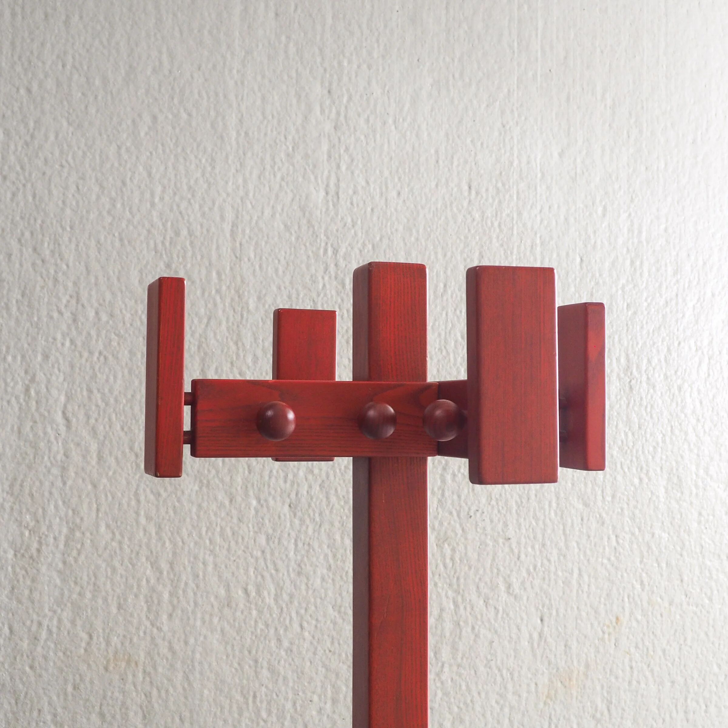 Postmodern red stained pine wood coat hanger