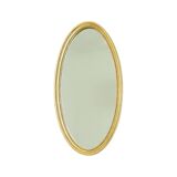 Miroir ovale doré de style Hollywood Regency