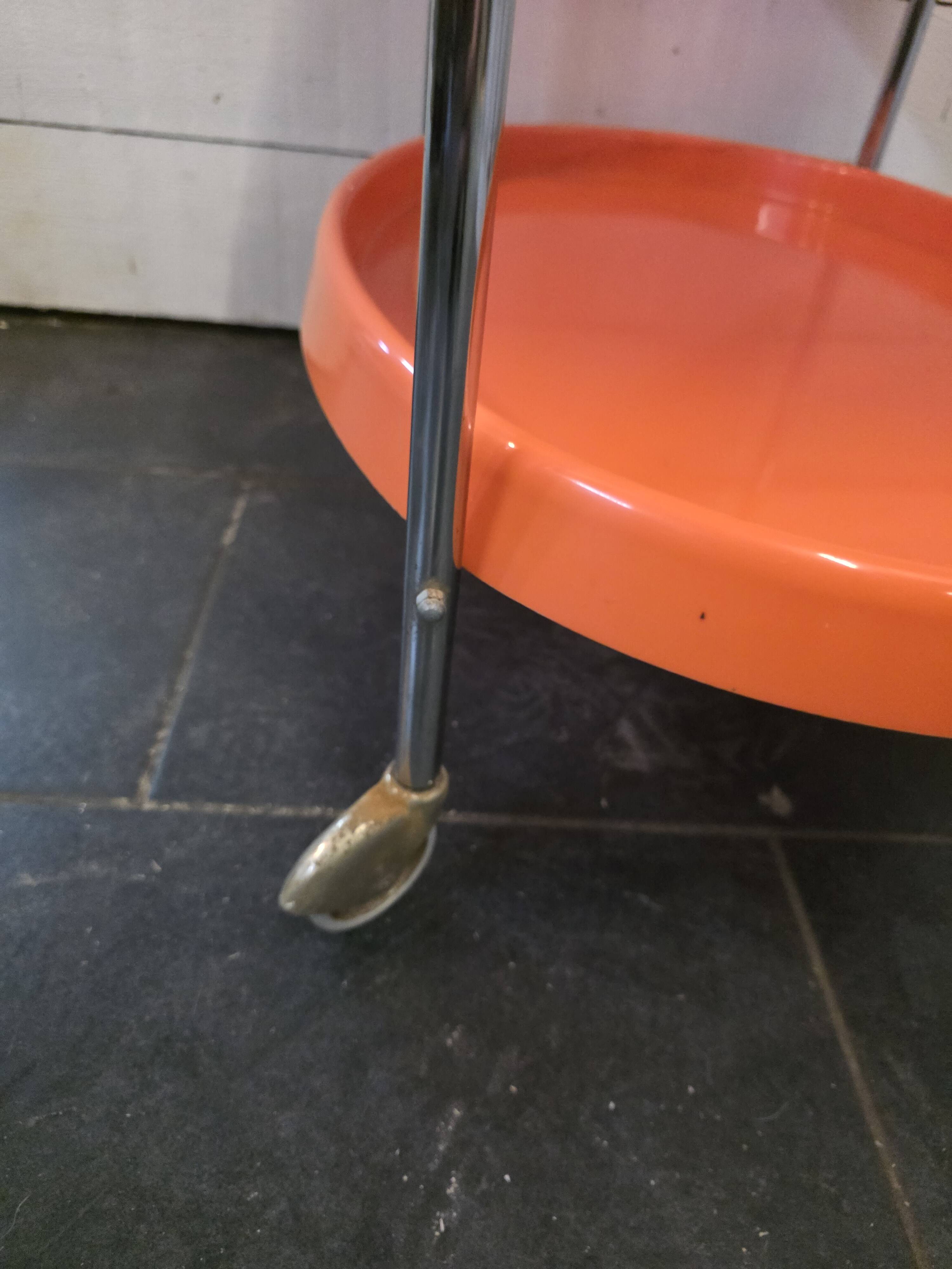 Orange rolling trolley from the 70s