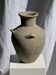 Light beige-grey Indonesian terracotta vase with 4 small handles and a high neck.