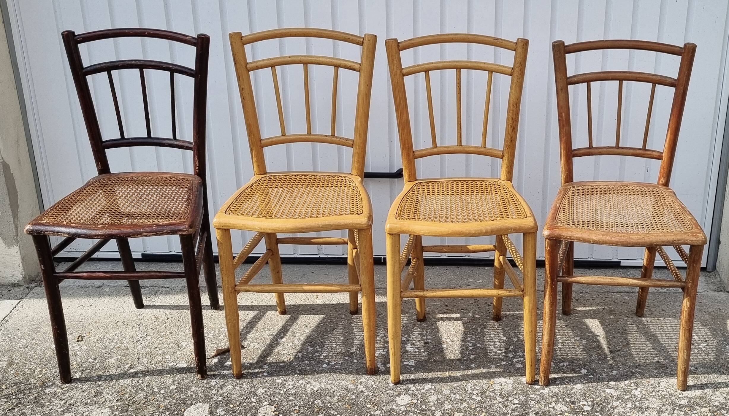 Set of 4 canned bistro chairs, early twentieth century