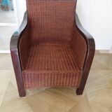 Vintage colonial-style armchair in woven rattan and exotic wood