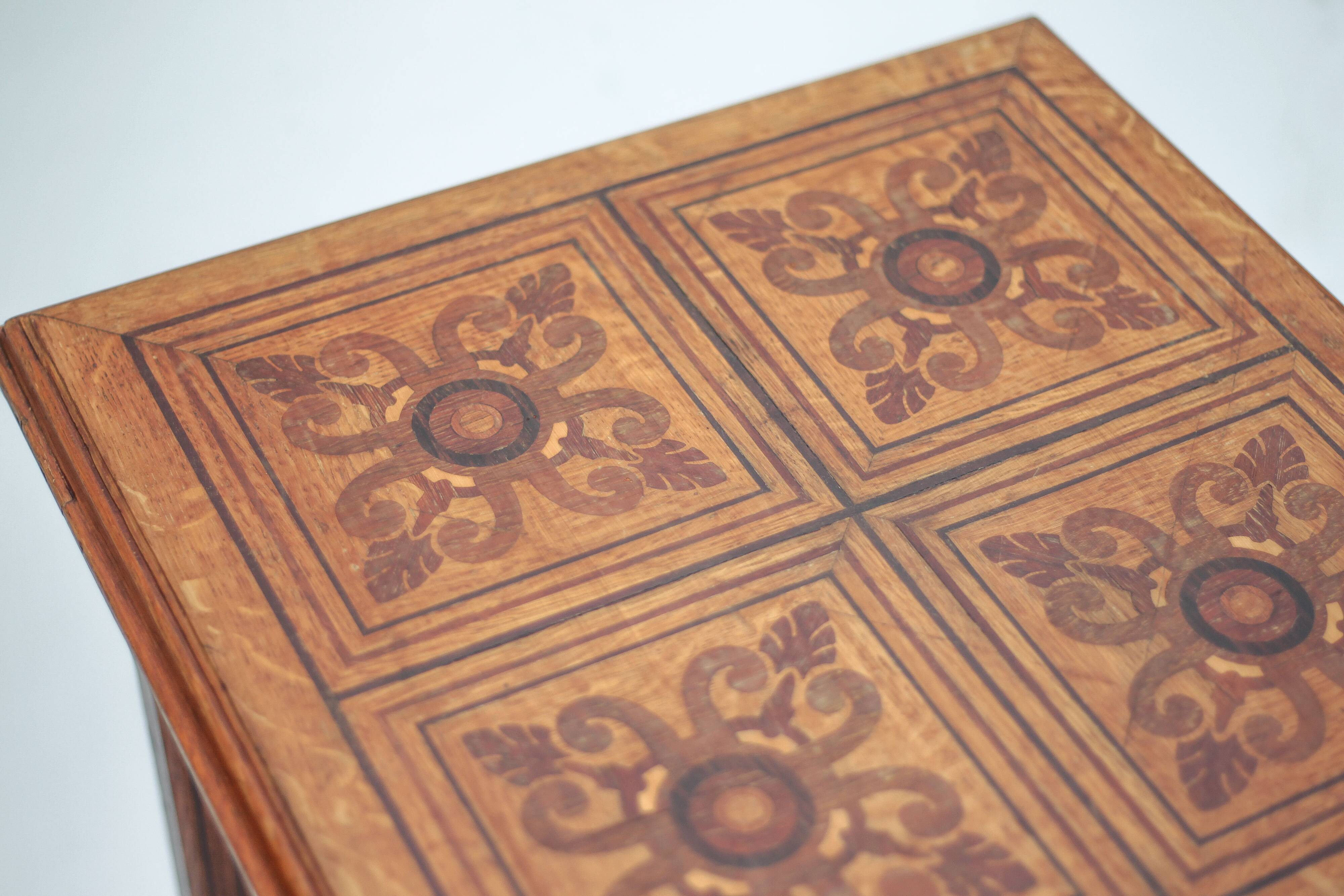Wood table with marquetry, table with an antique parquet top, antique table.