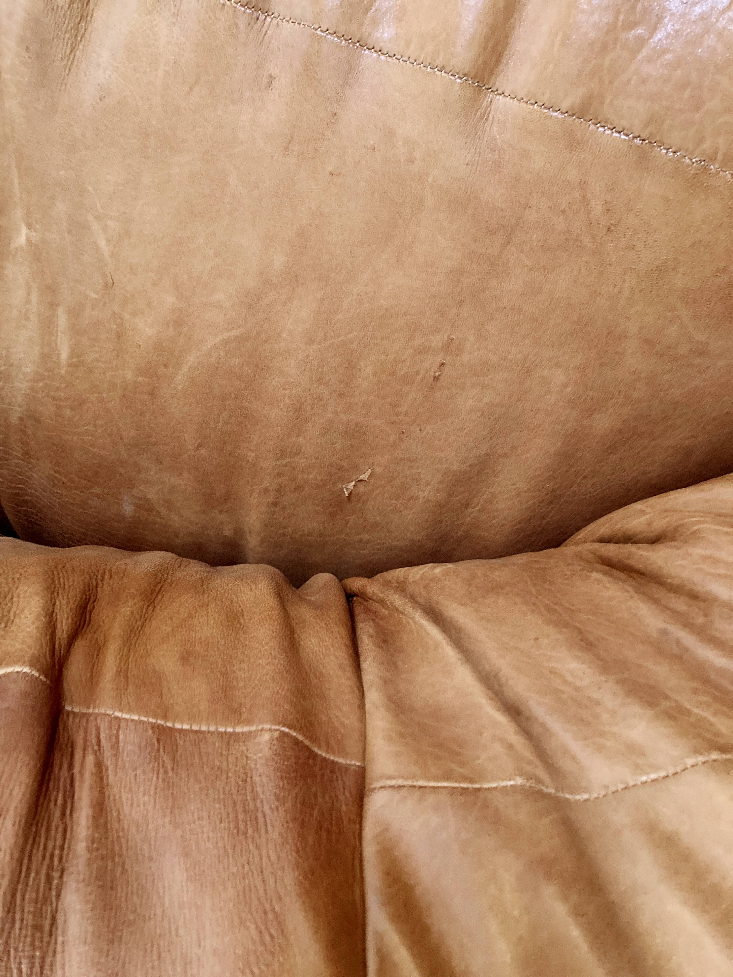 Two-seater leather pouf sofa by Raphaël Raffel for Honoré Paris