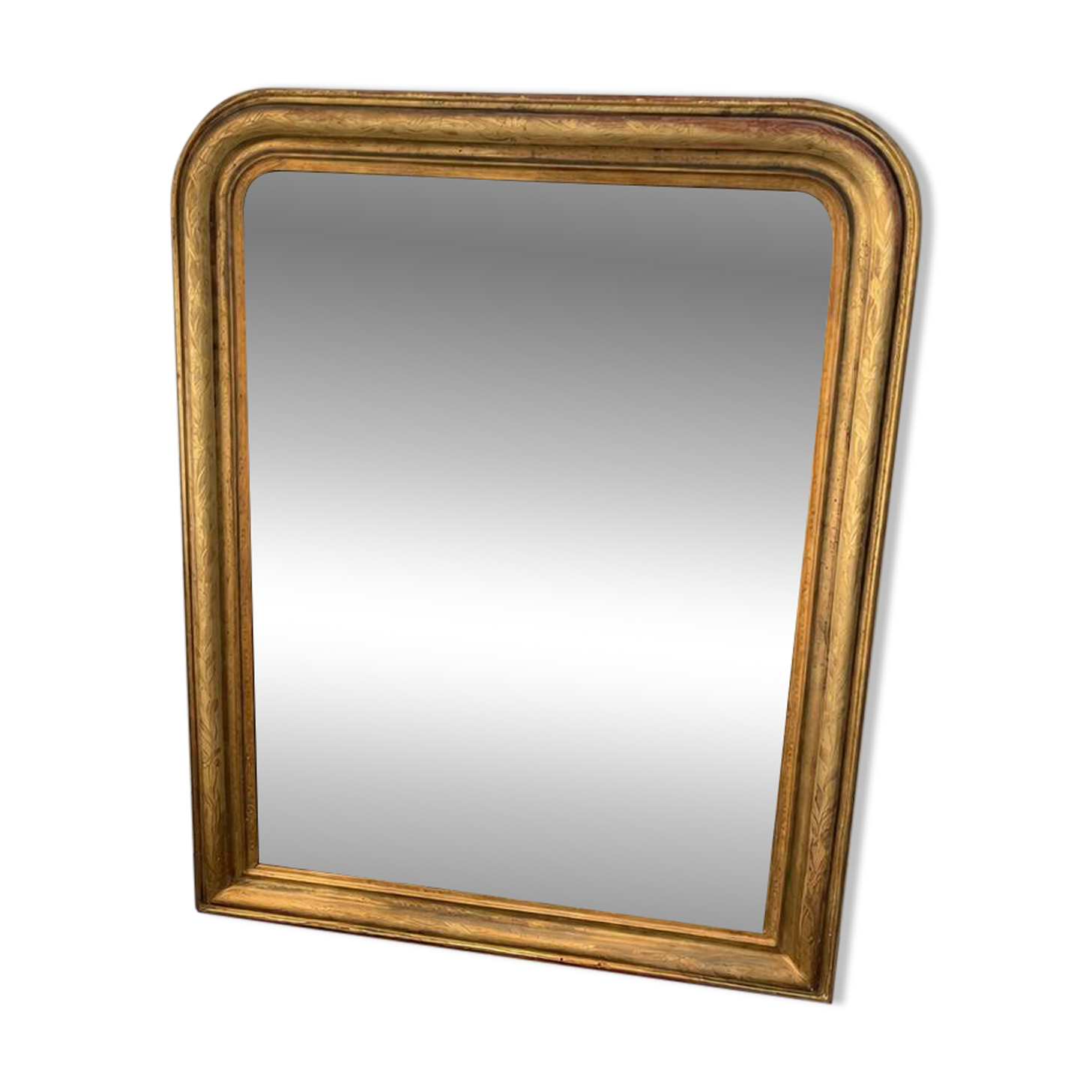 Large Louis-Philippe gilded mirror with gold leaf