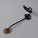 Old metal hook and wooden ball