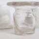 Three white porcelain and glass inkwells for school desk