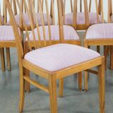 Set of 8 vintage Danish design dining chairs from the 1970s with light purple fabric seats