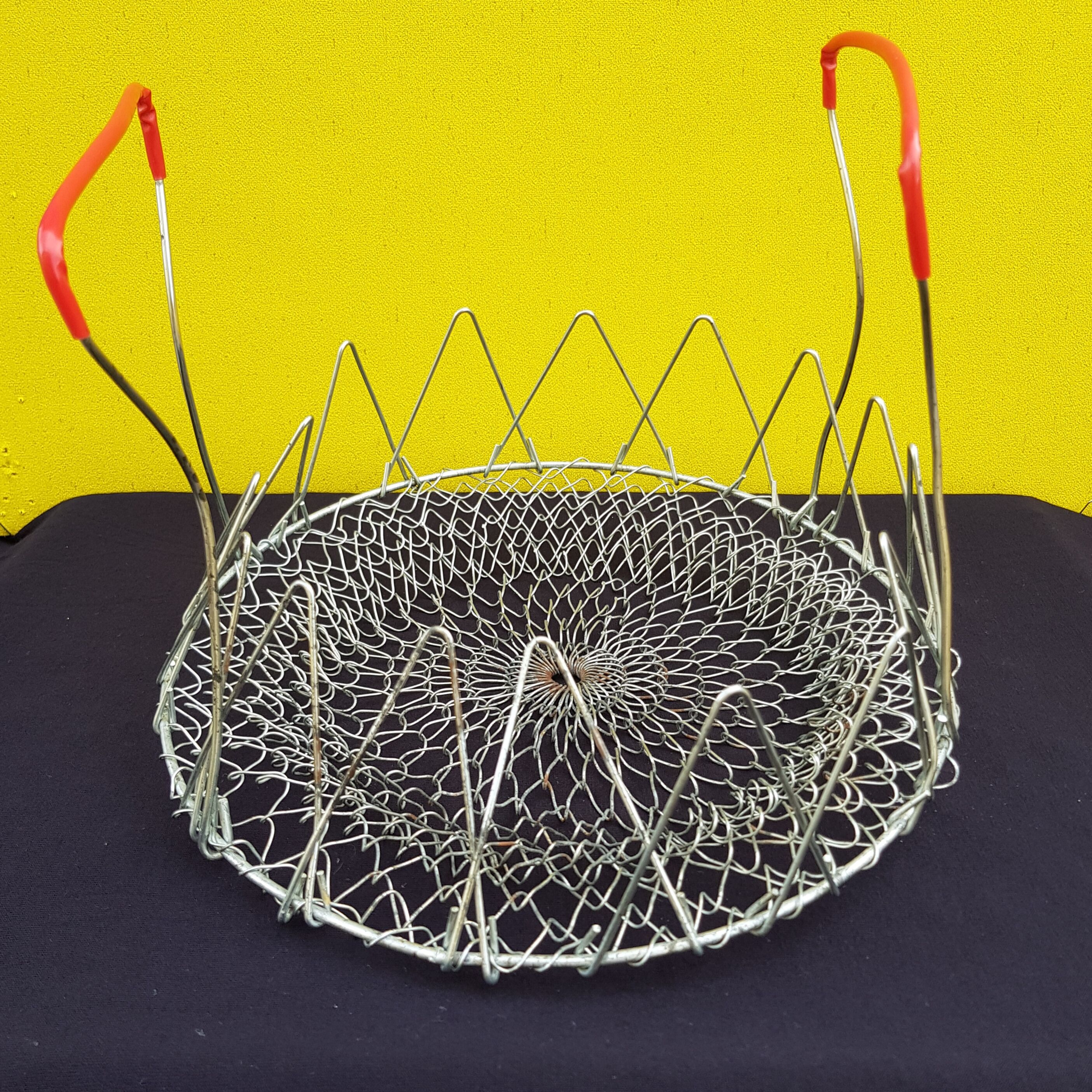 Old folding salad basket