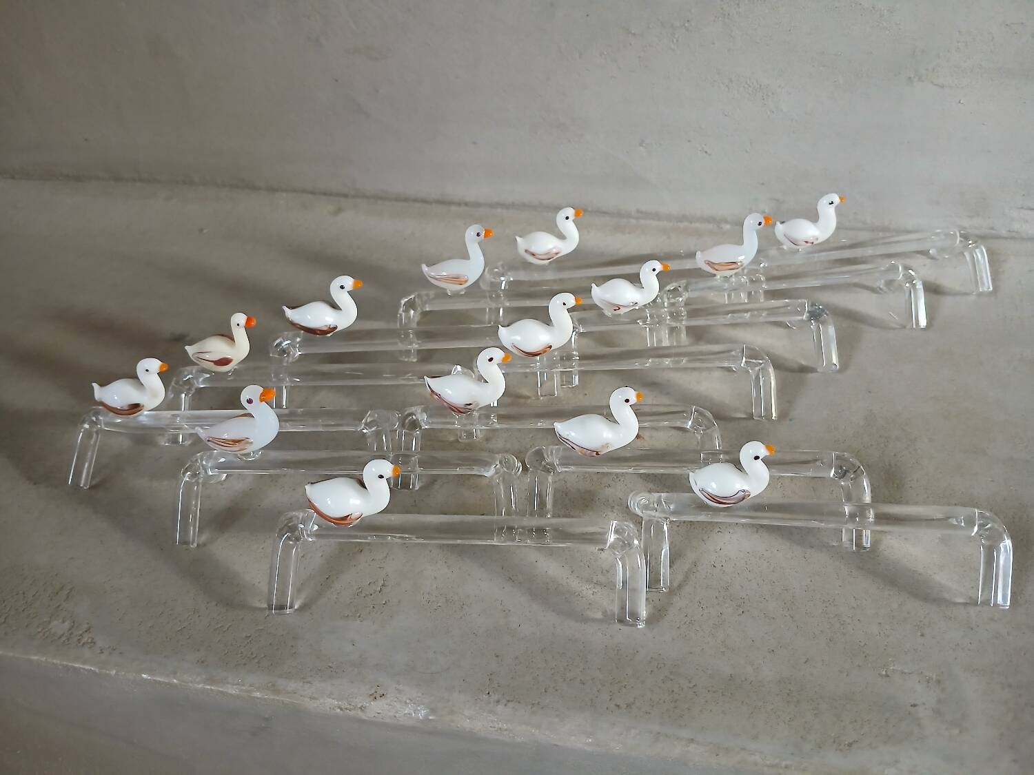 14 antique glass knife rests / ducks