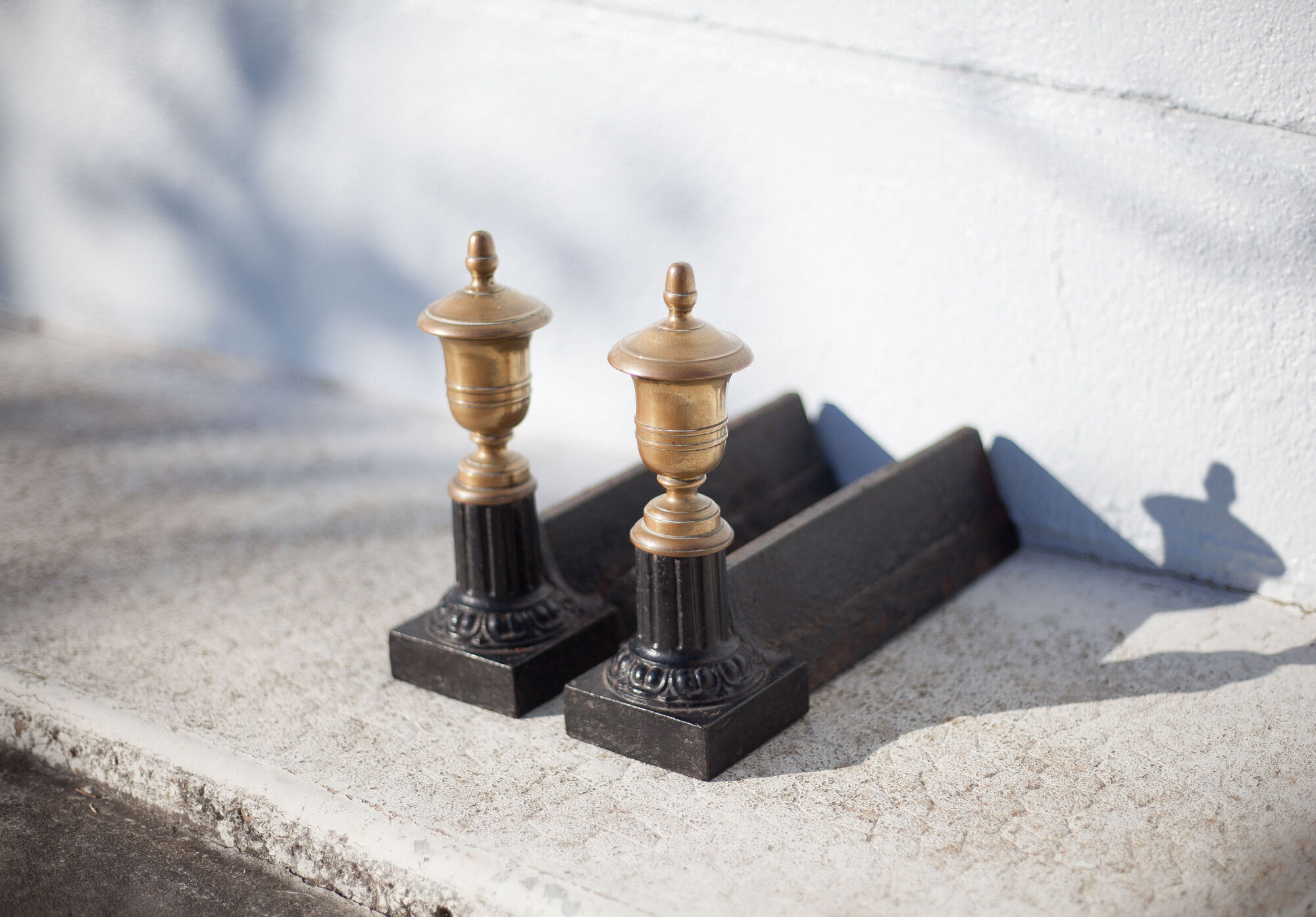 Cast iron and brass chenets