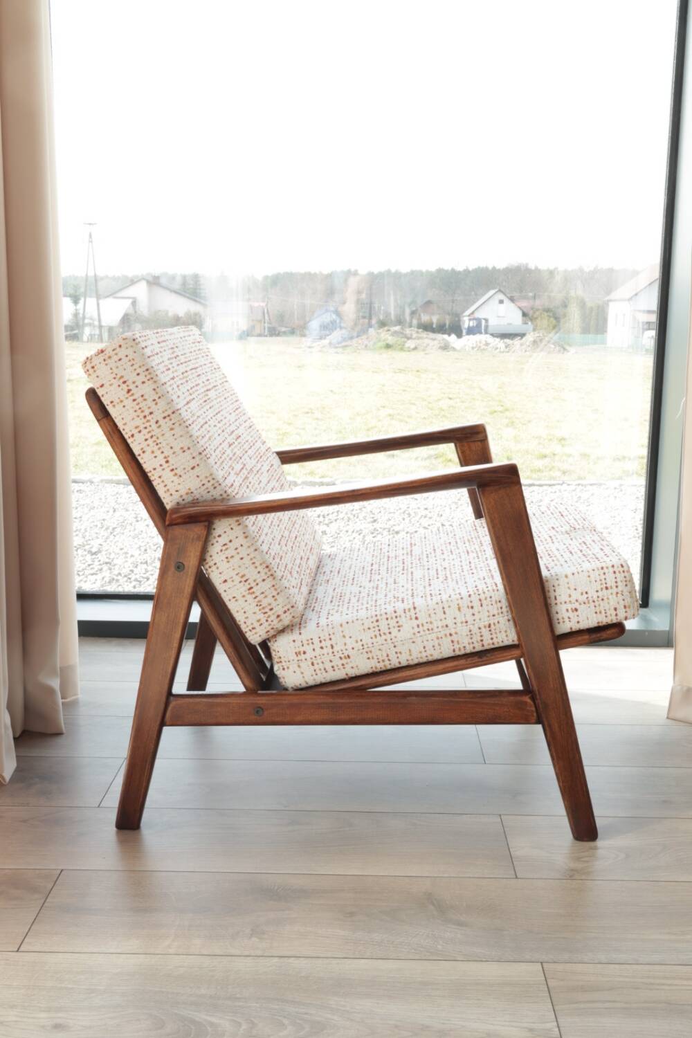 Vintage Danish boucle armchair with orange polka dots from the 1960s.