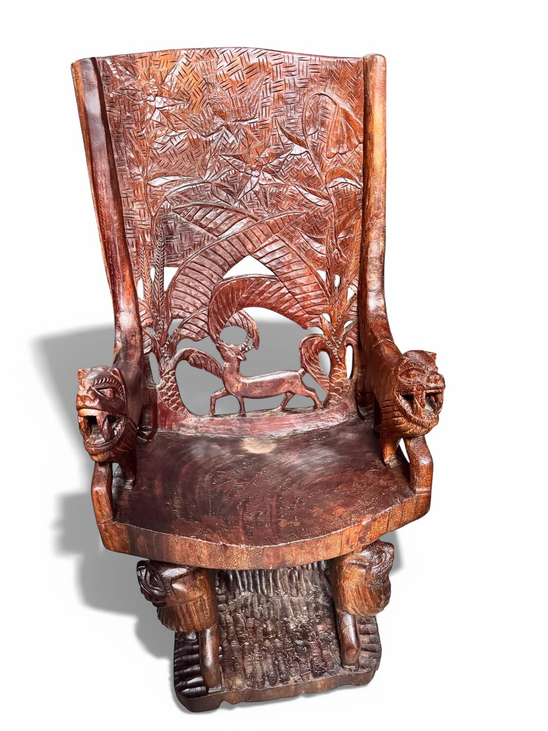 Pair of carved African armchairs