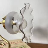 Swan neck wall light in brass with glass tulip.