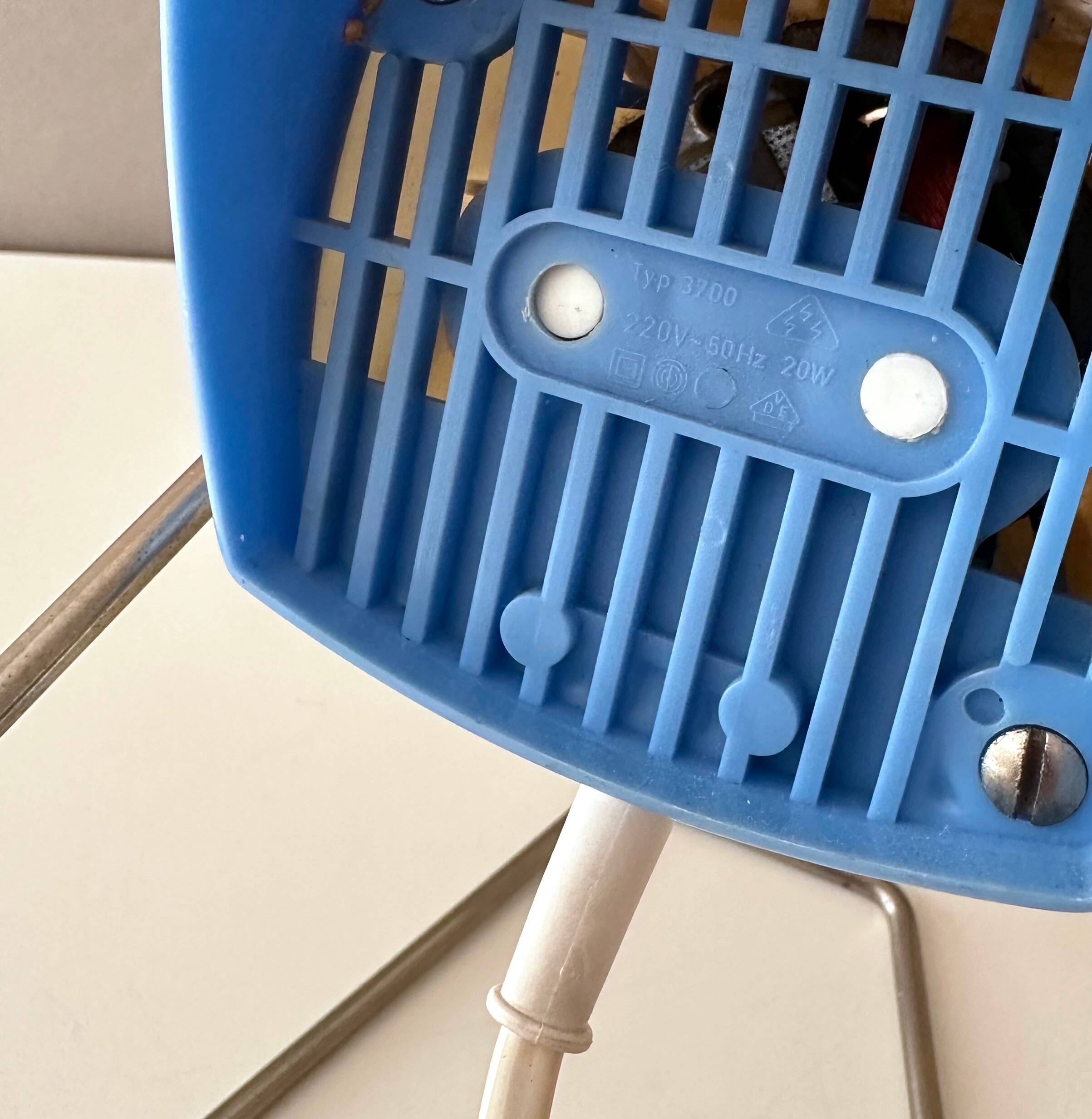 Blue Severin electric fan, mid-century office