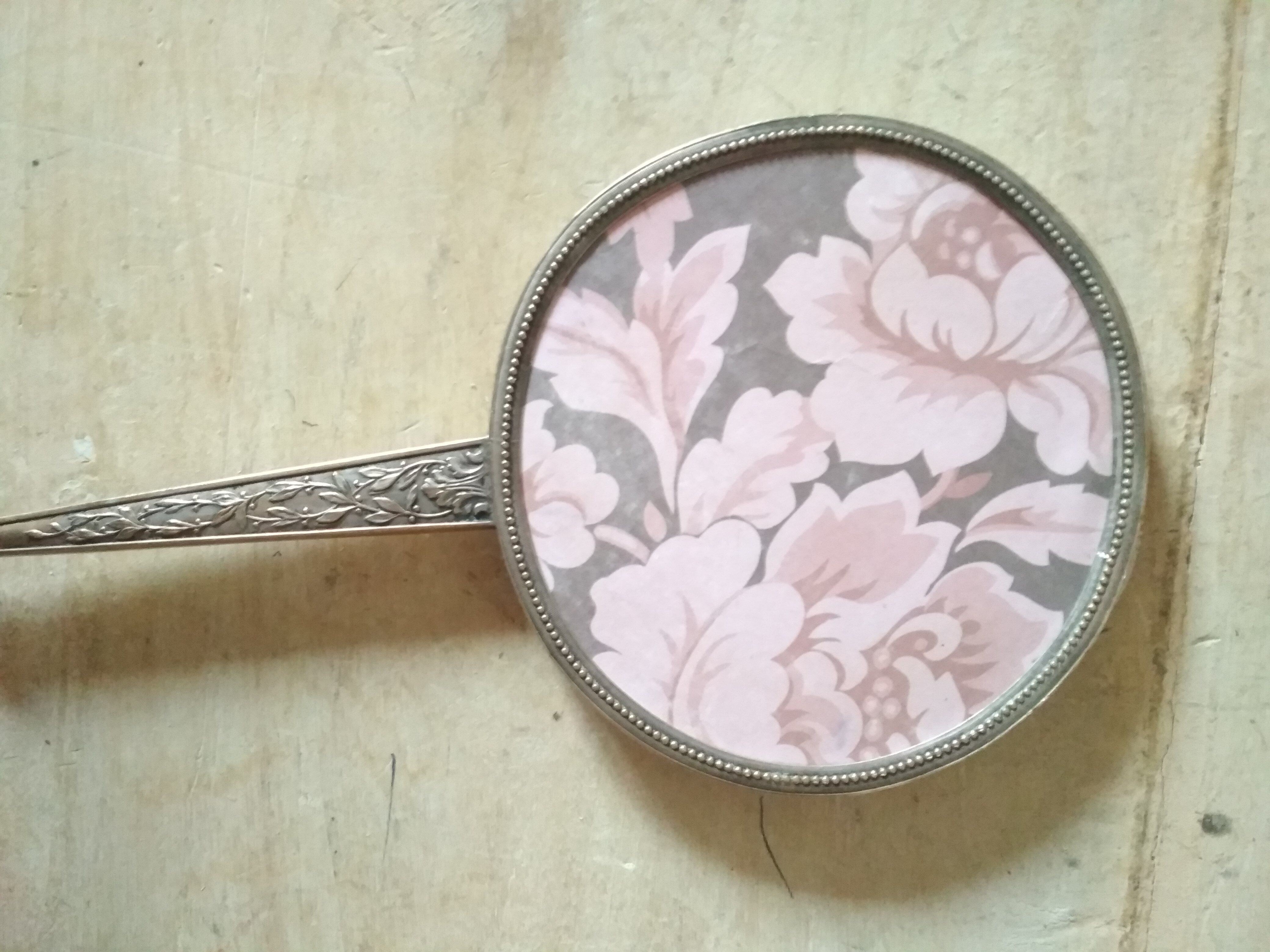 Old hand mirror beveled glass