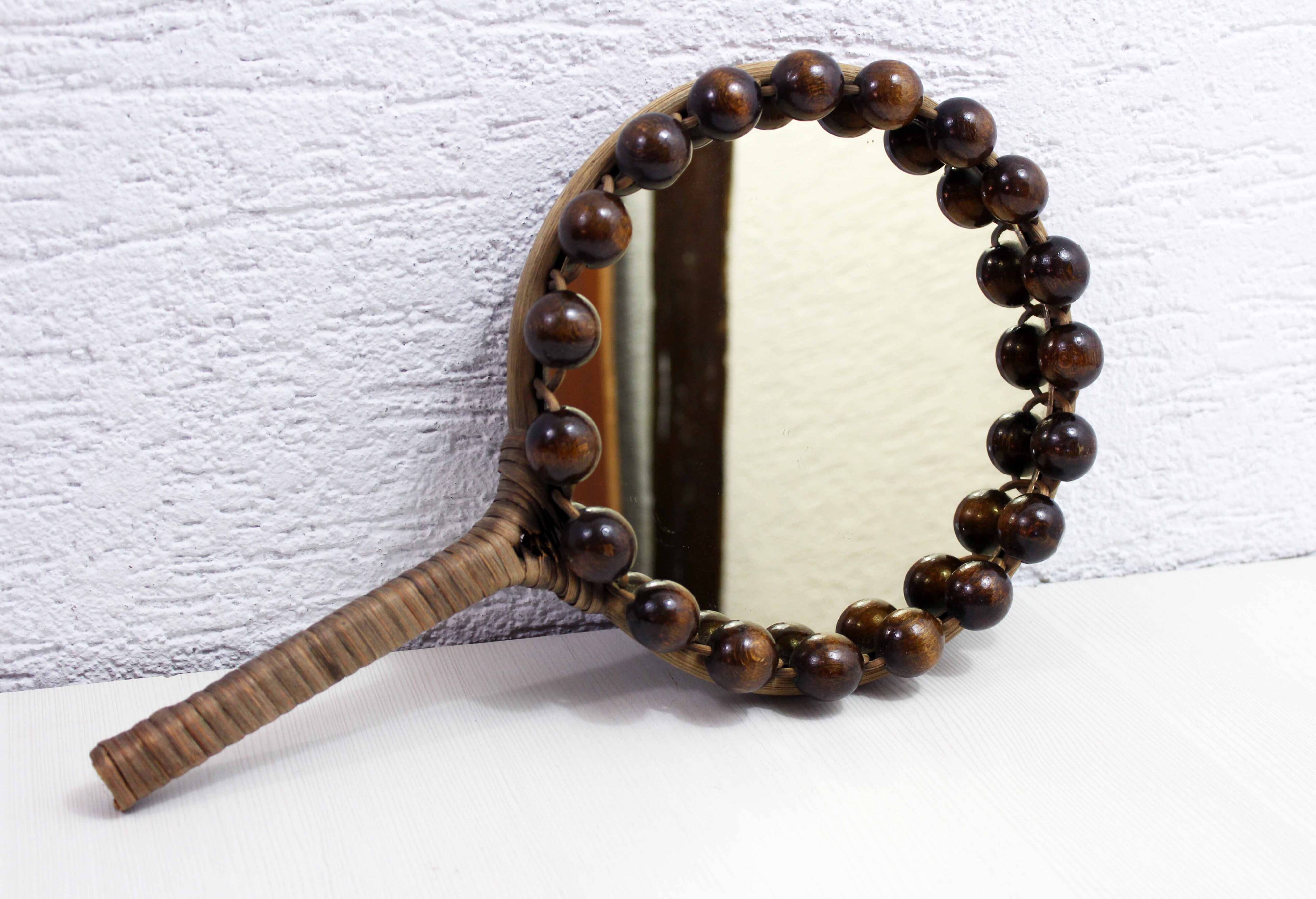 Miroir à main en osier vintage