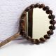 Miroir à main en osier vintage
