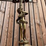 Large bronze candle holder with putti angel