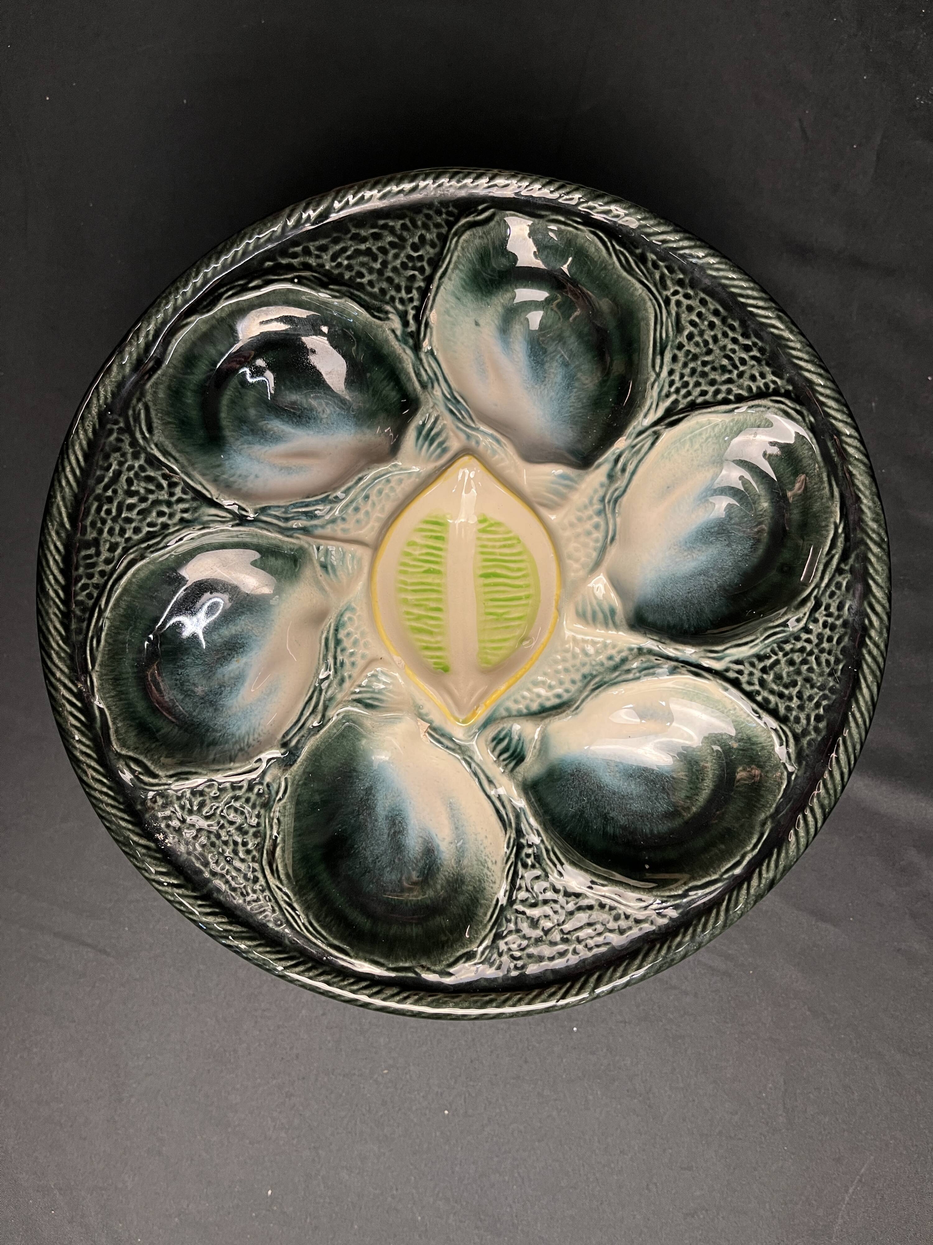 Set of 10 Saint Clément oyster barbotine plates circa 1940