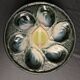 Set of 10 Saint Clément oyster barbotine plates circa 1940