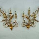 Pair of large floral wall lamps in gilded and lacquered metal. Italy 1960s