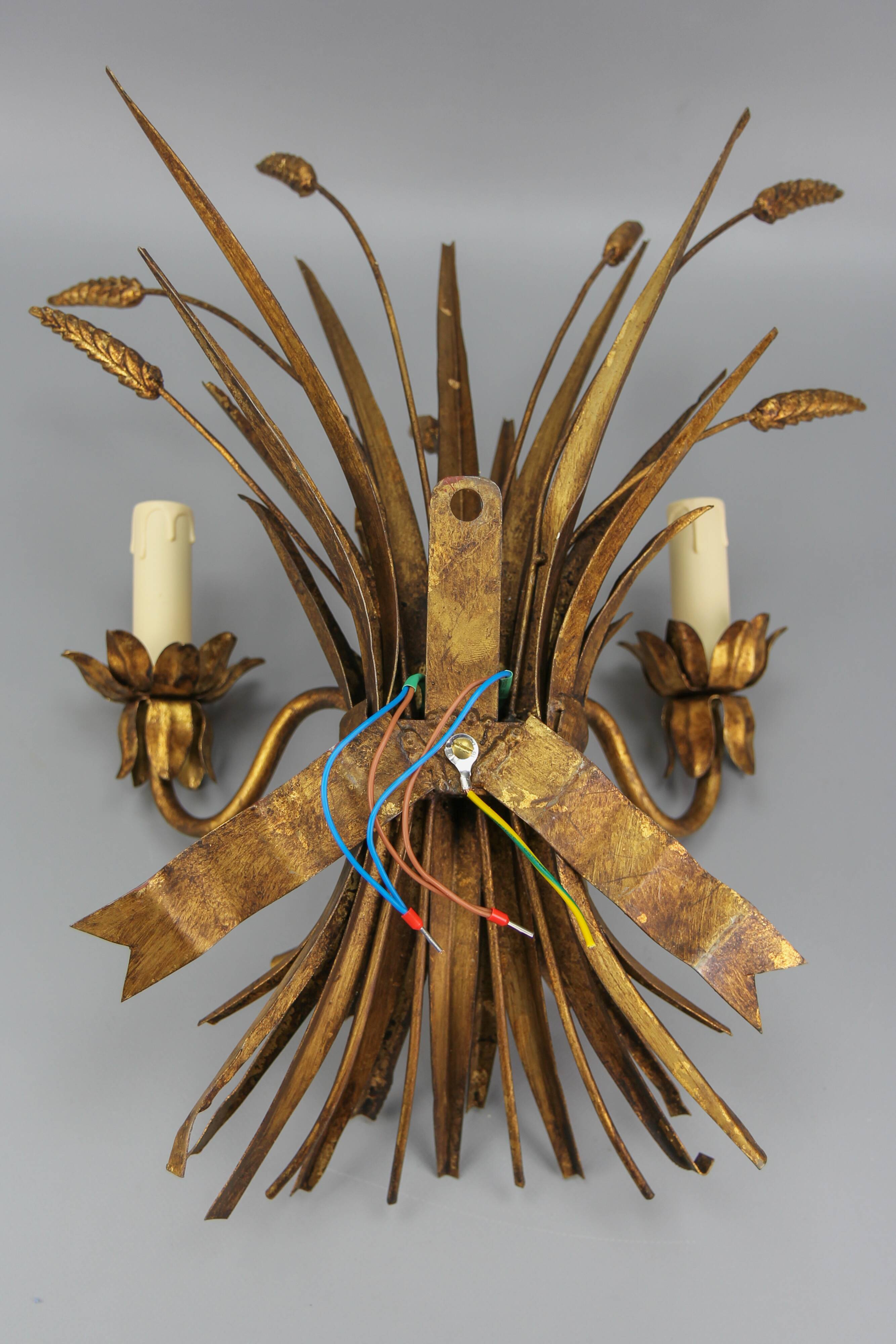 Gilt metal wheat sheaf two-light wall sconce