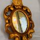 Miroir vintage en bois doré