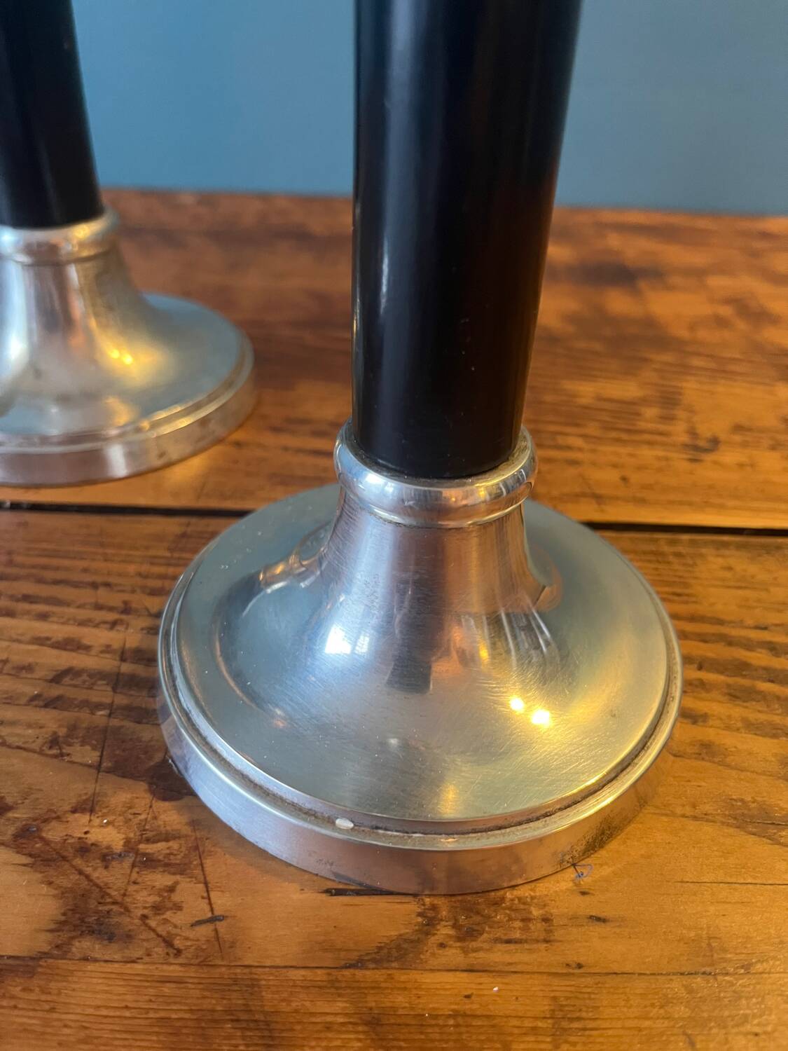 Trio of metal and wood candlesticks from the 80s
