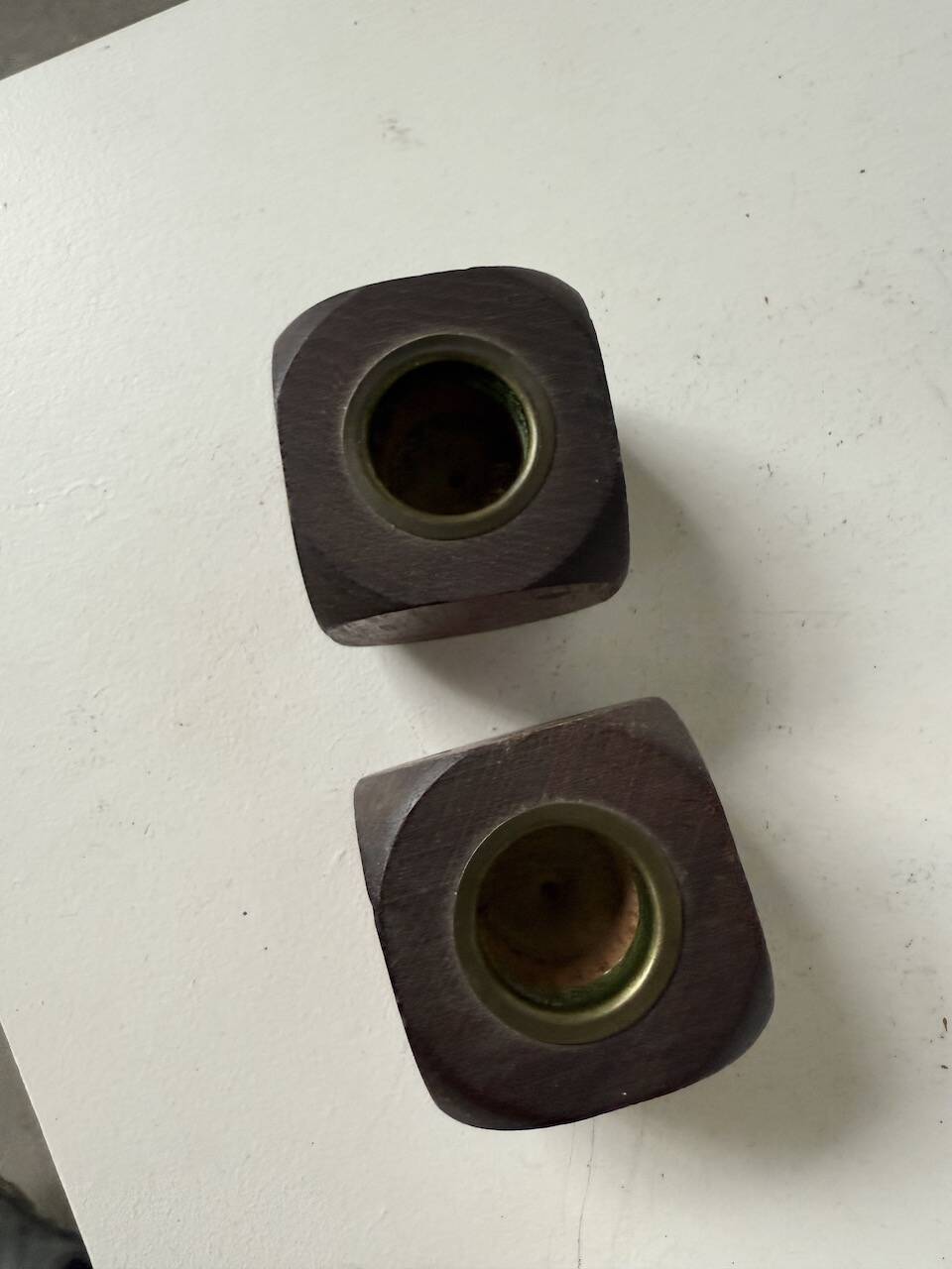 Pair of 1960s teak and brass "dice" candlesticks