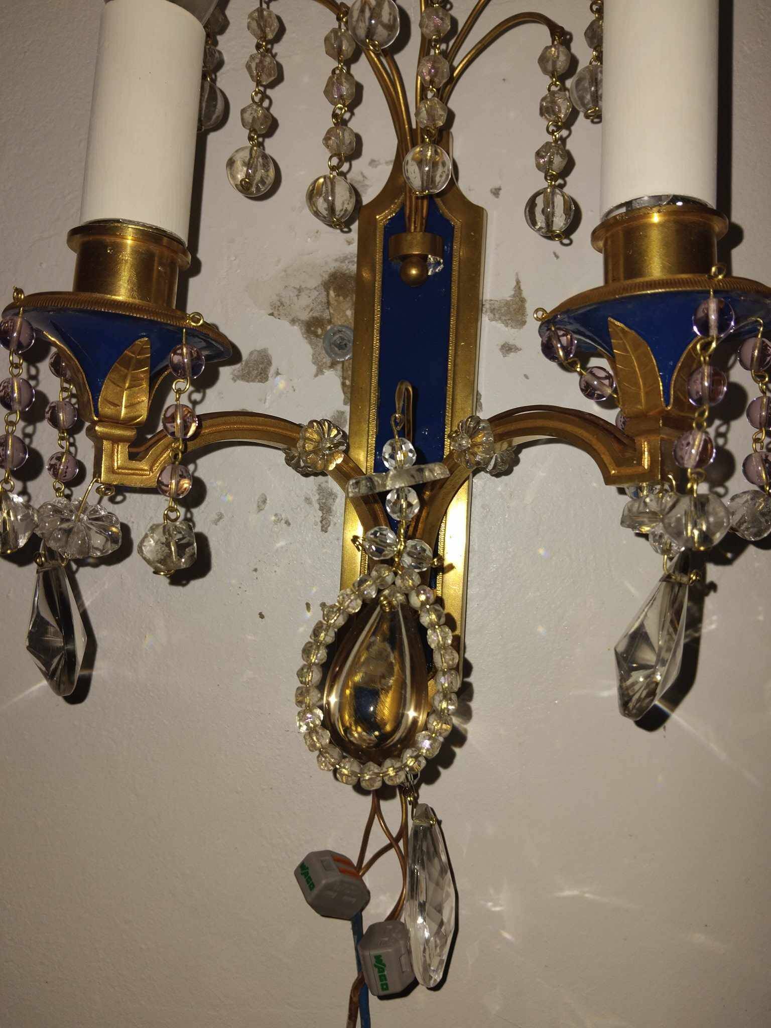 Pair of Louis XVI style gilt bronze wall lights