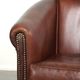 Sheepskin club armchair in English style with brown colour scheme