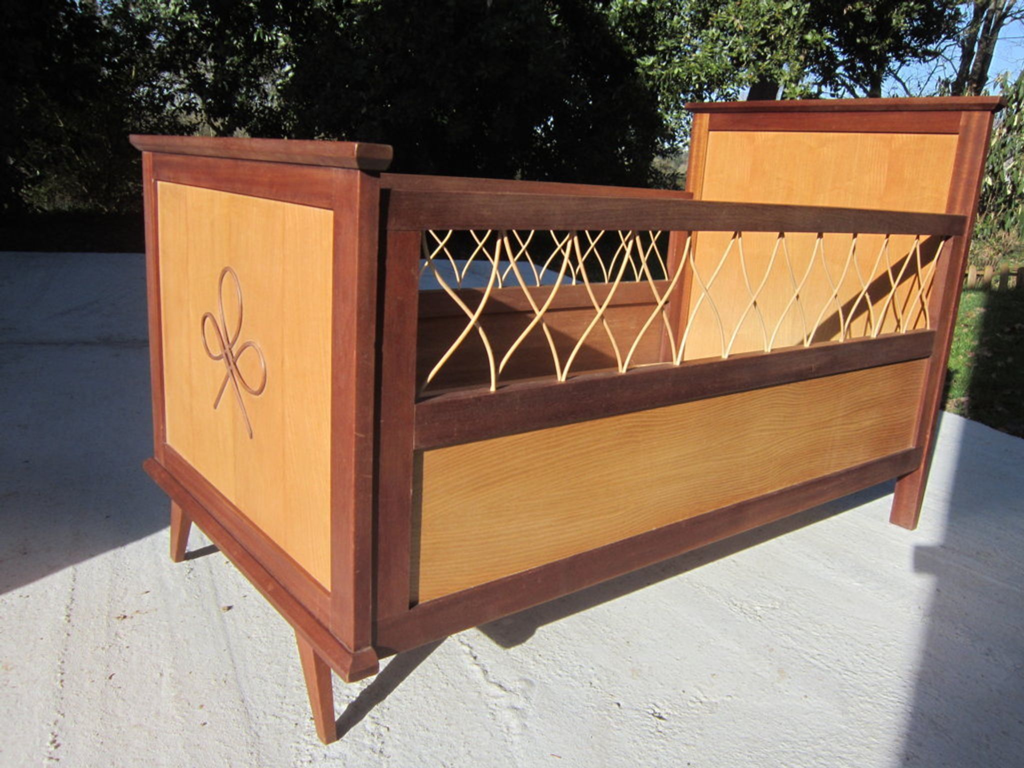 Wood and rattan child bed