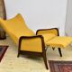 Yellow boucle wingback chair with folding footstool, 1950s